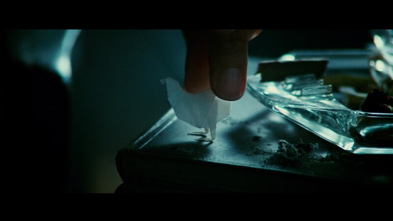 Hand Placing Origami Crane
