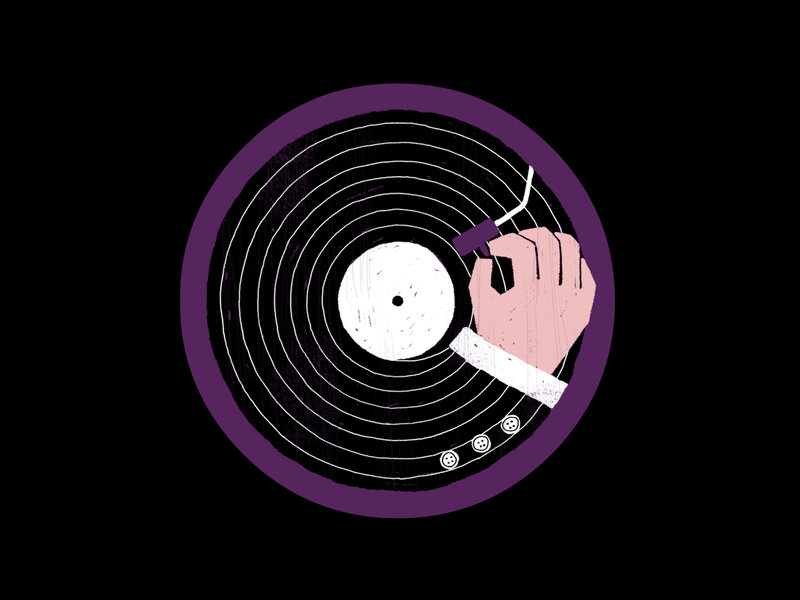 hand placing record on turntable