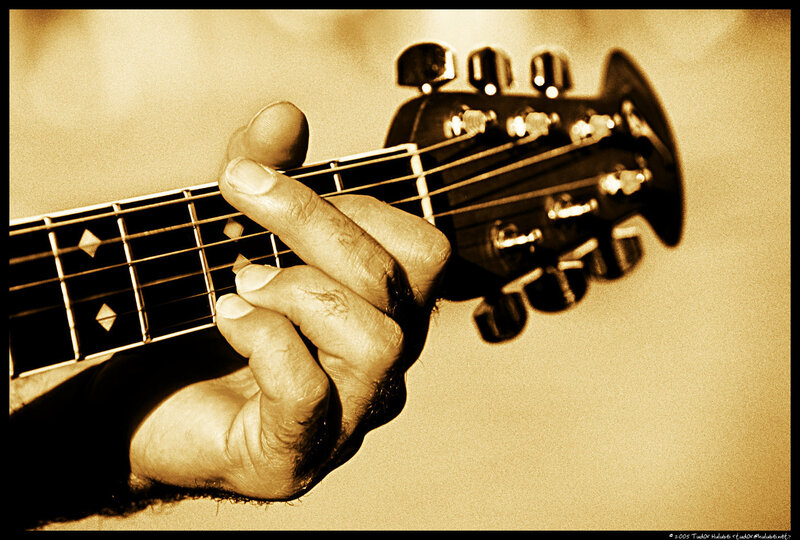hand playing guitar