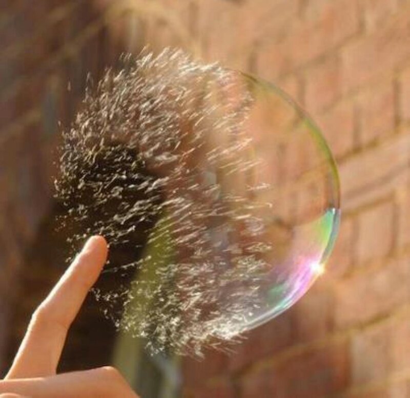Hand Popping Bubble — Brown