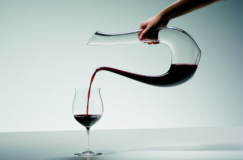 Hand Pouring Red Wine
