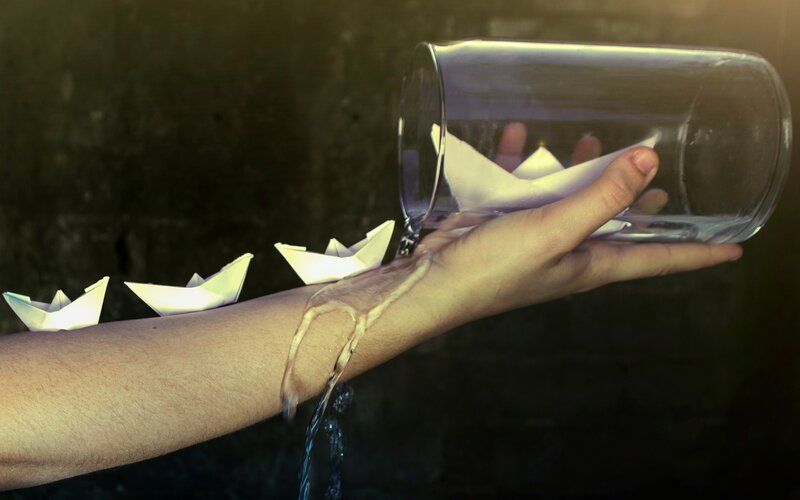 Hand Pouring Water
