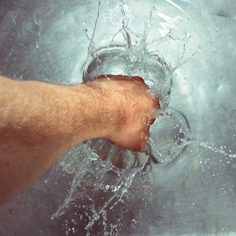 Hand Punching Water — White, Dynamic