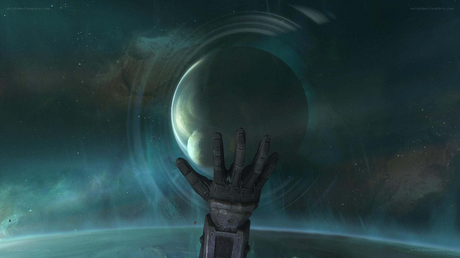 hand reaching for planet