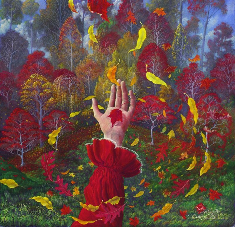 Hand Reaching into Autumn Leaves