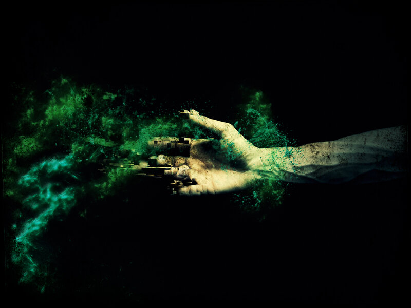 Hand Reaching Through Green Mist