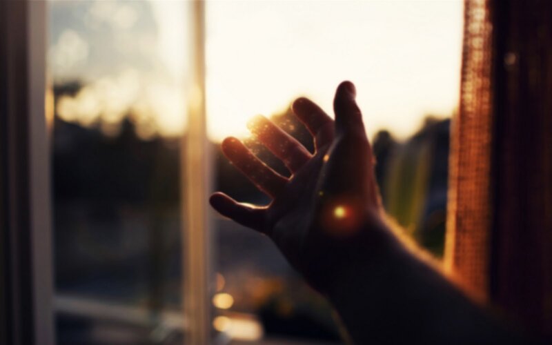 Hand Reaching Toward Sun — Gold