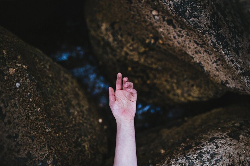 Hand Reaching Up — Brown