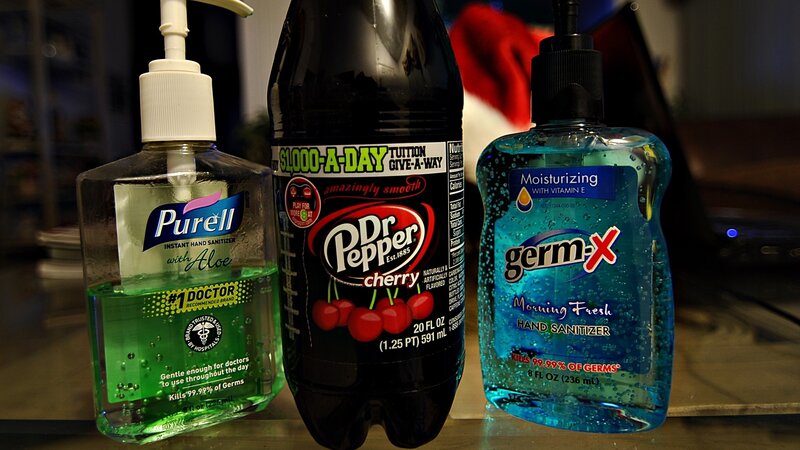 Hand sanitizers and soda bottle