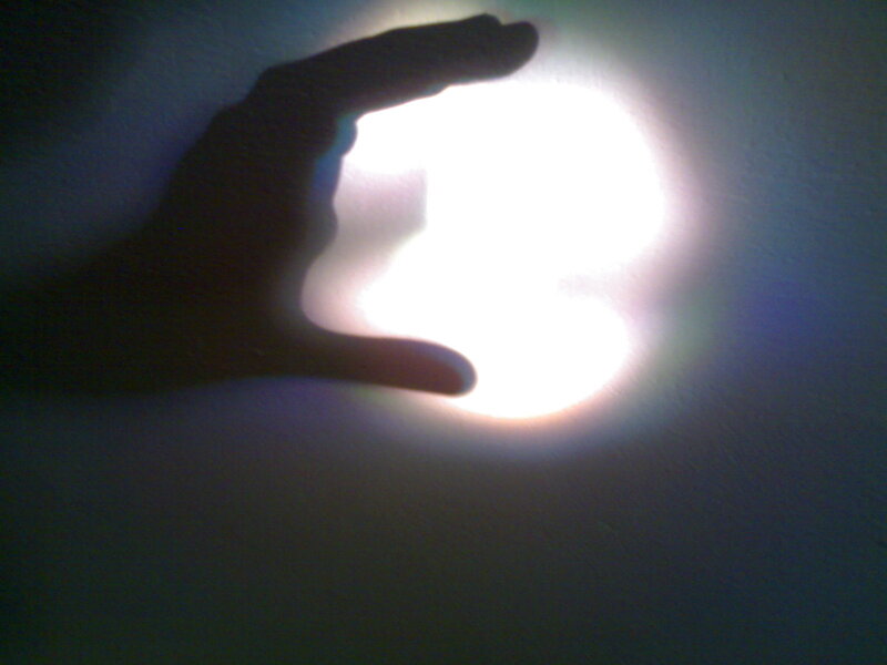 hand shadow on bright light