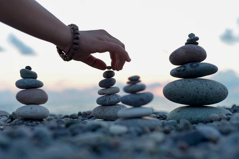 Hand Stacking Stones