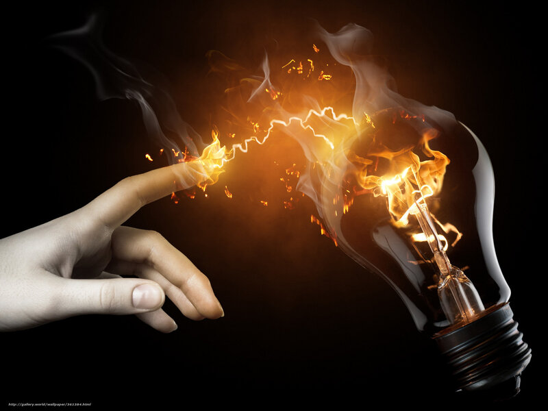 hand touching light bulb