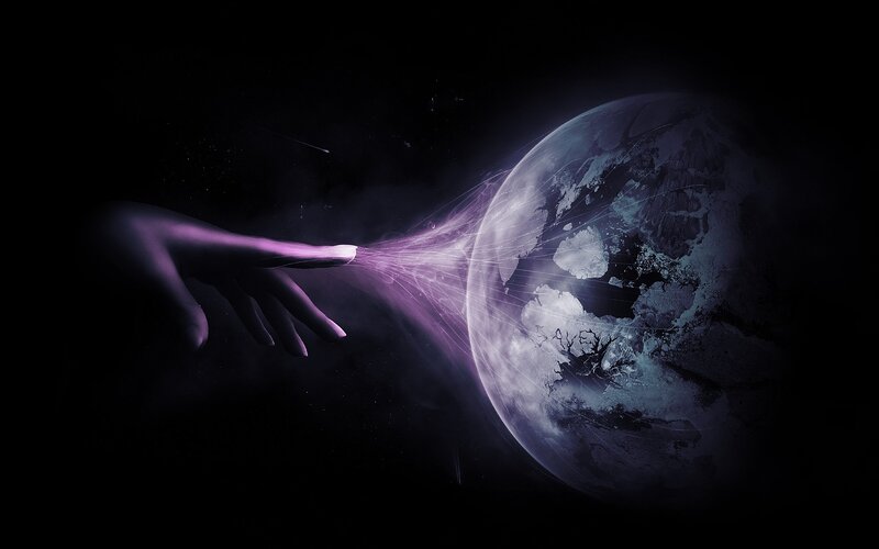 hand touching planet