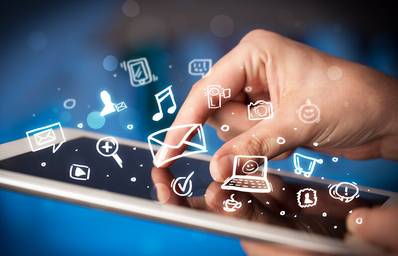 hand using tablet with icons
