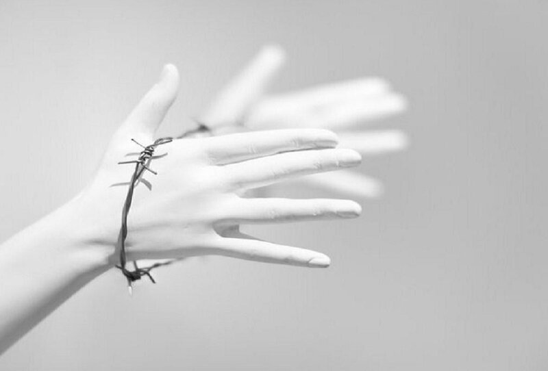 Hand with Barbed Wire