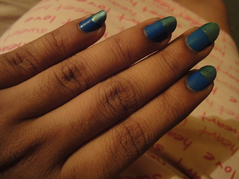 hand with blue and green nails