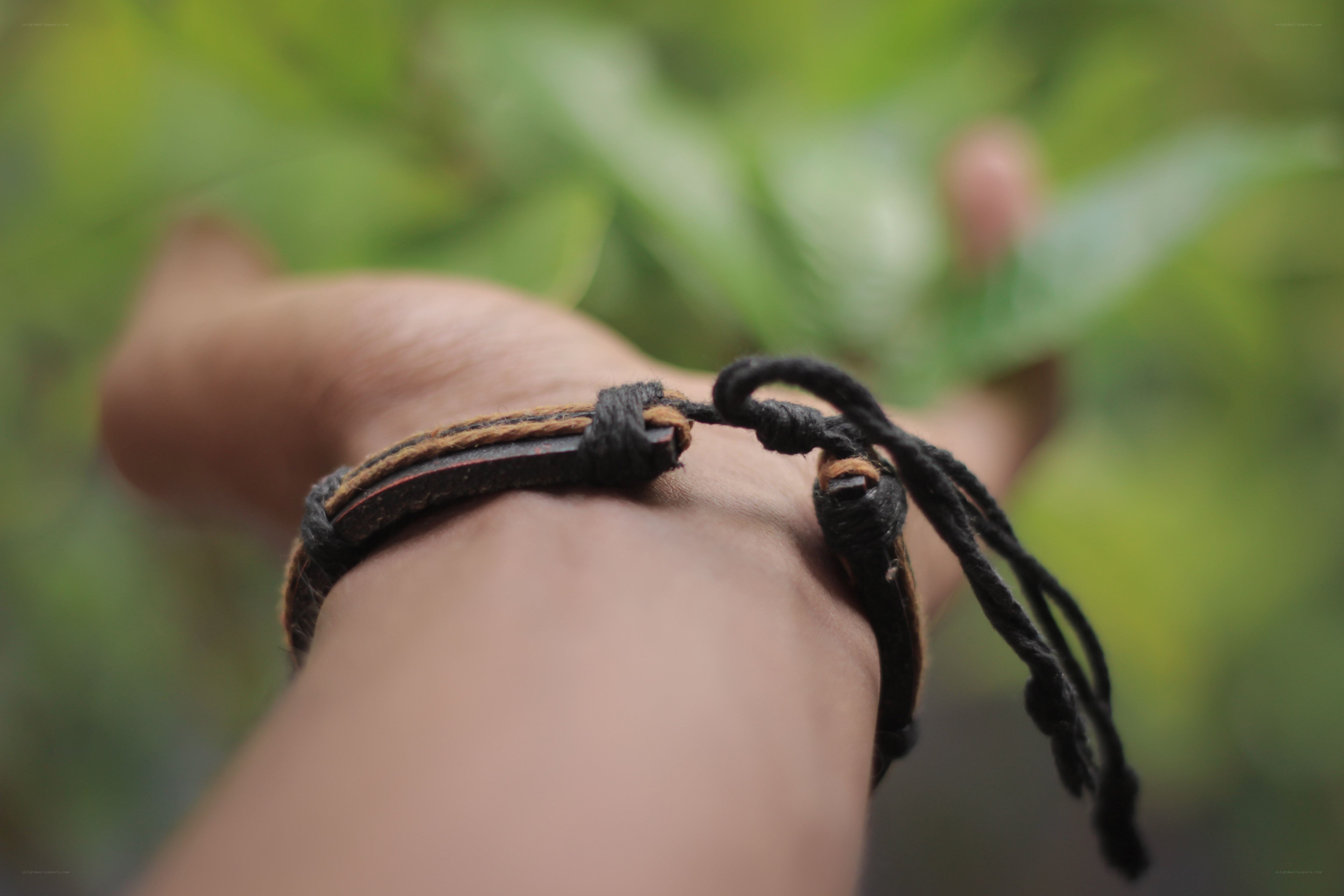 hand with bracelet outdoors