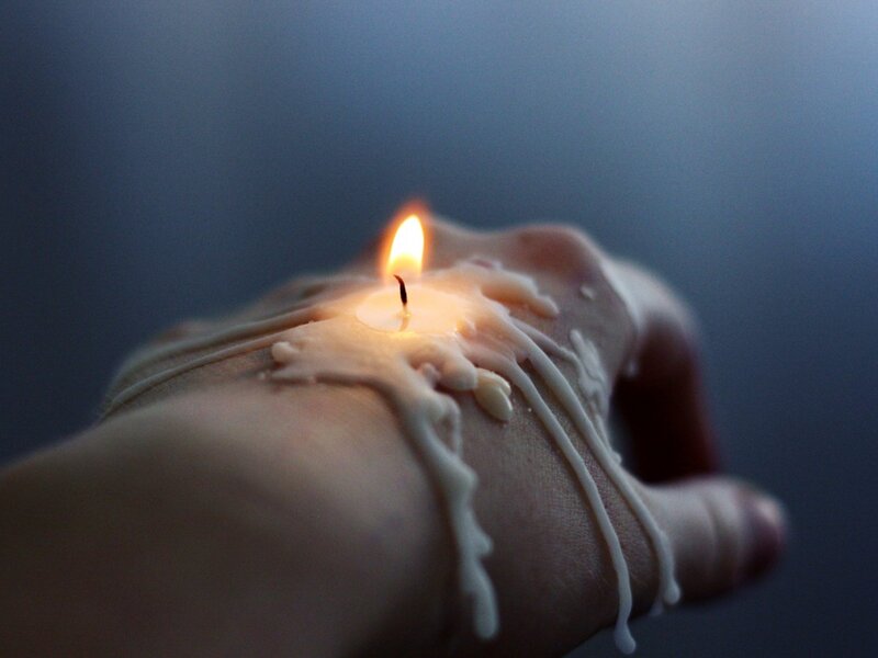 Hand with Burning Candle — White