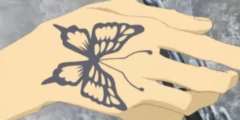 Hand with Butterfly Tattoo