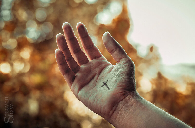 Hand with Cross Tattoo