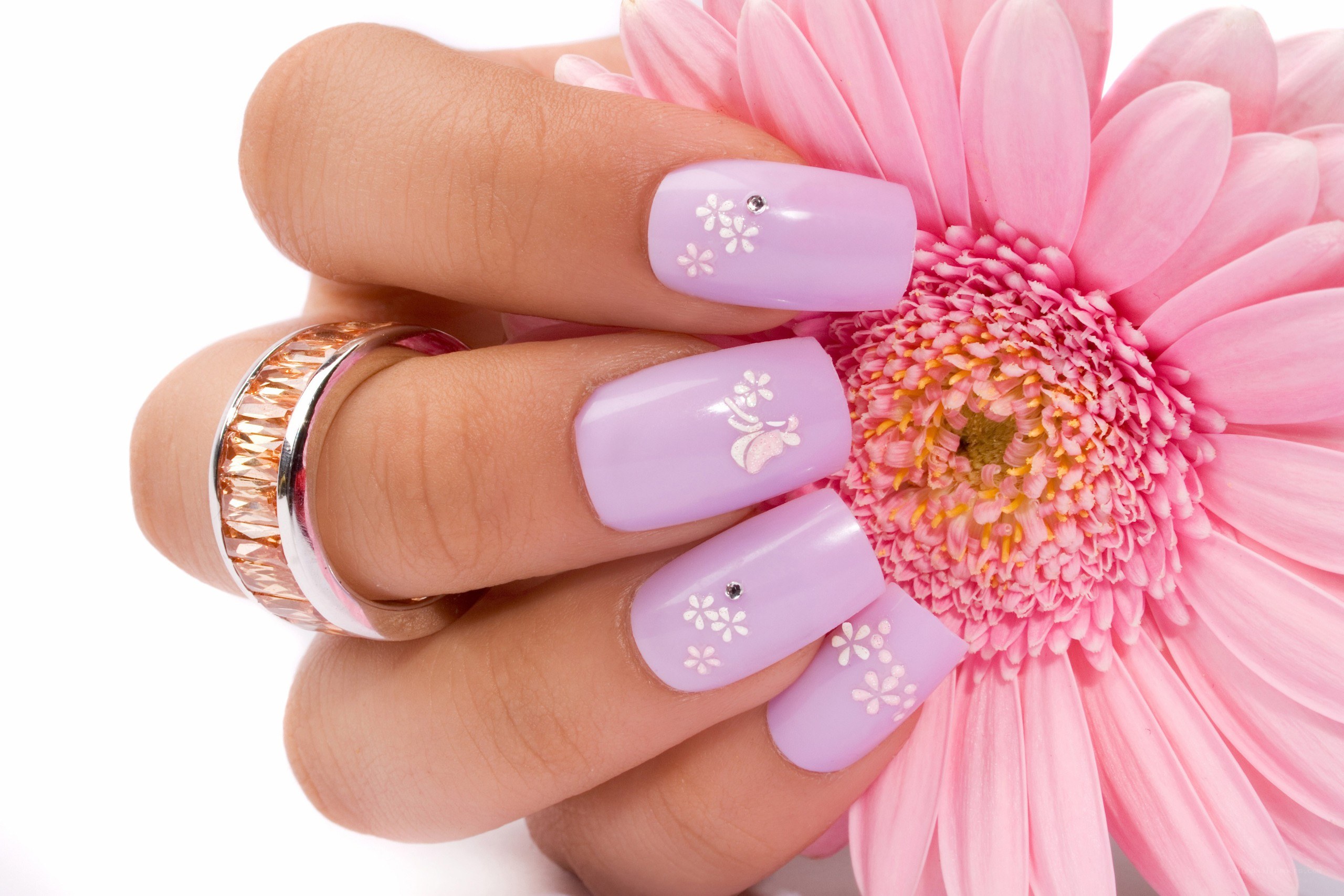 hand with floral nail art