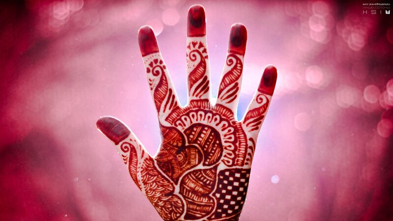 Hand with Henna Design — Red, Dramatic, Photograph, Bokeh