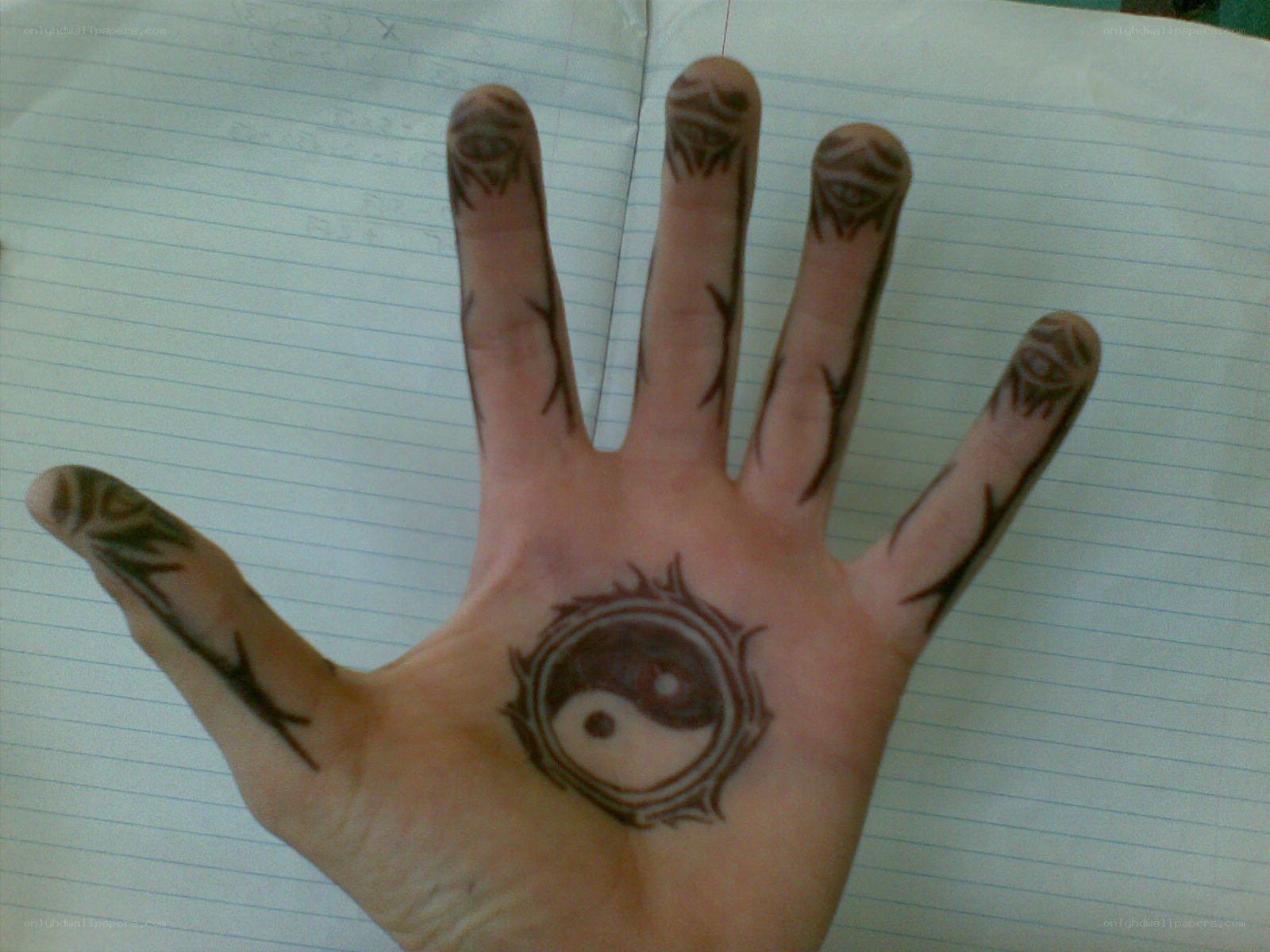 hand with henna tattoos