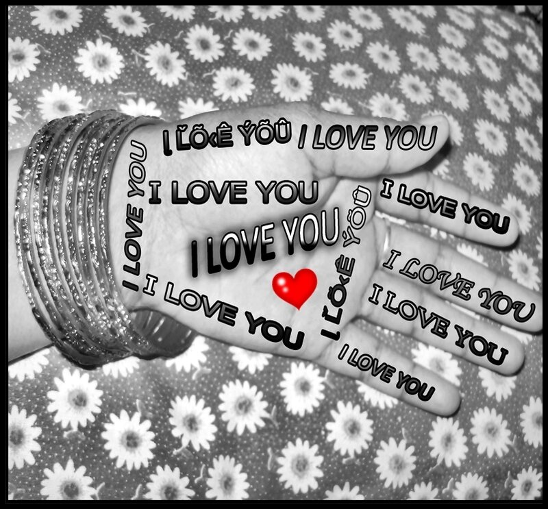 Hand with I LOVE YOU Text