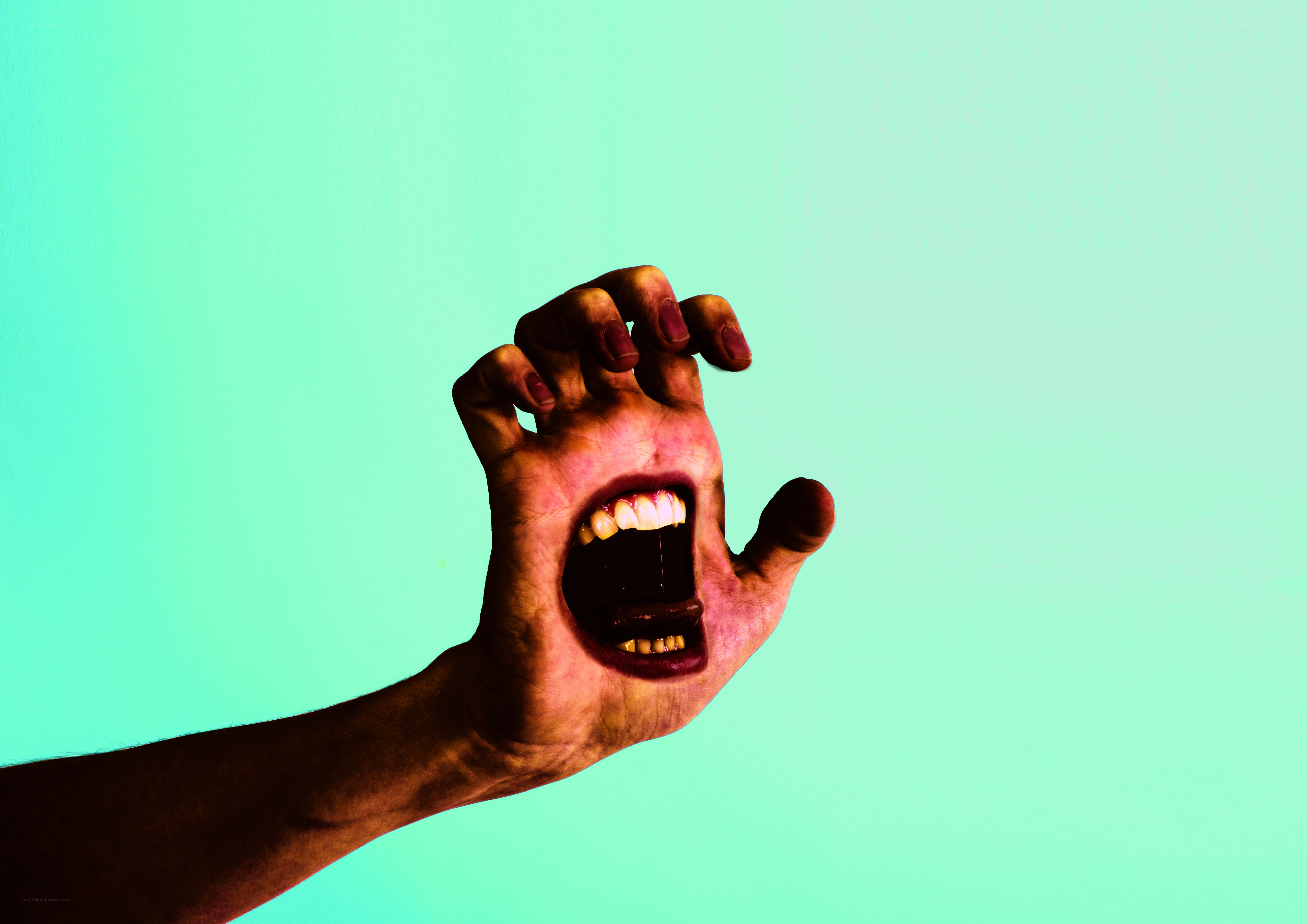 hand with mouth on palm