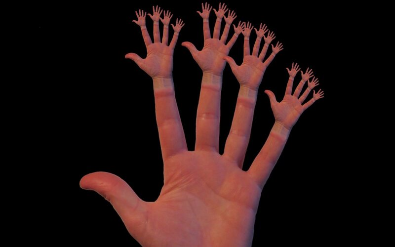 Hand with multiple smaller hands