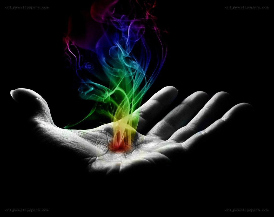hand with rainbow smoke
