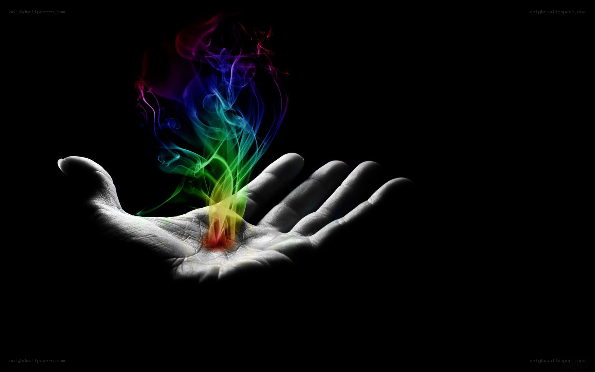 hand with rainbow smoke