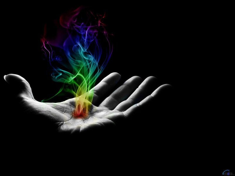 hand with rainbow smoke