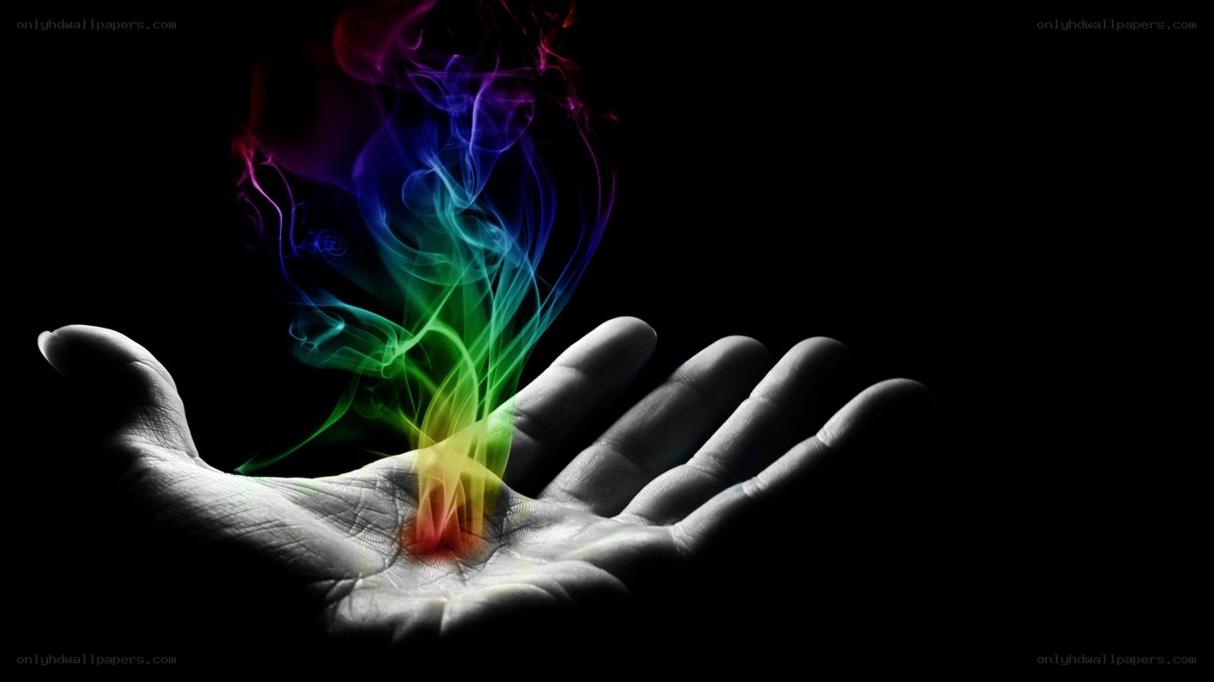 hand with rainbow smoke