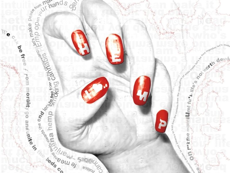 hand with red nail art