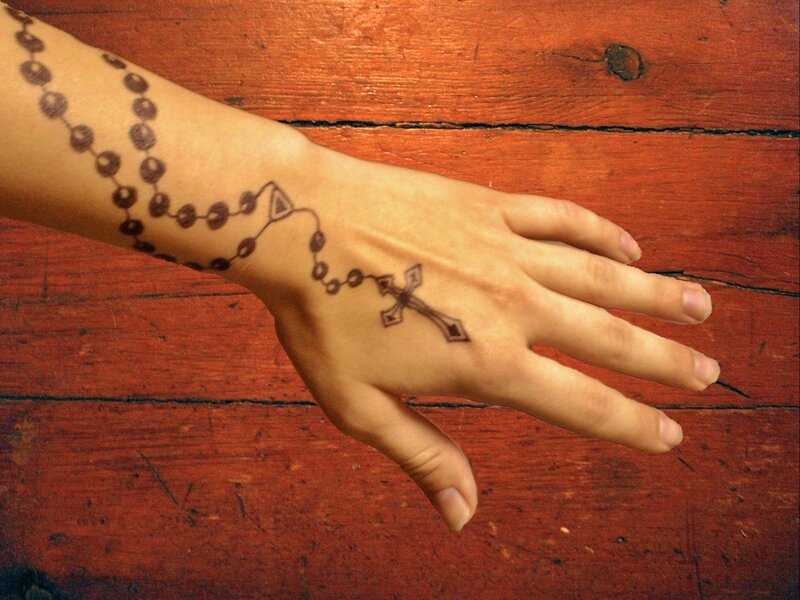 Hand with Rosary Tattoo — Brown