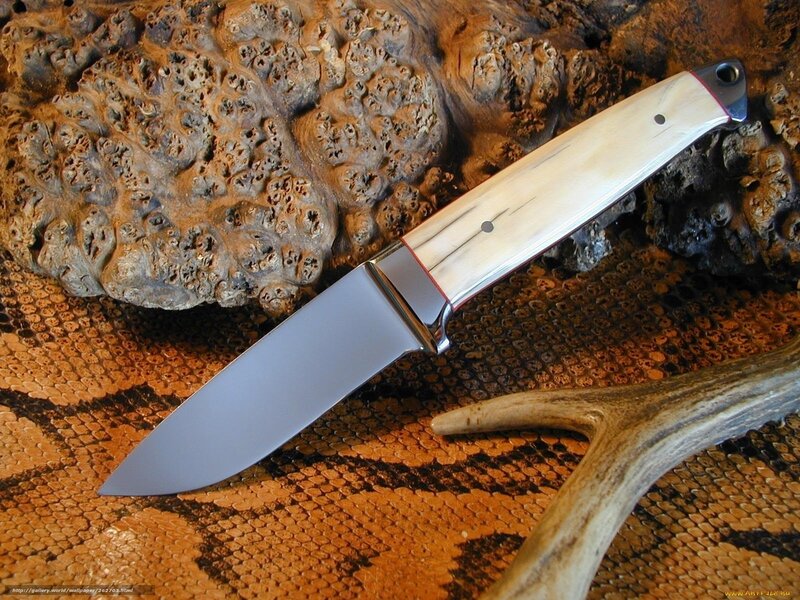 handcrafted knife on wood