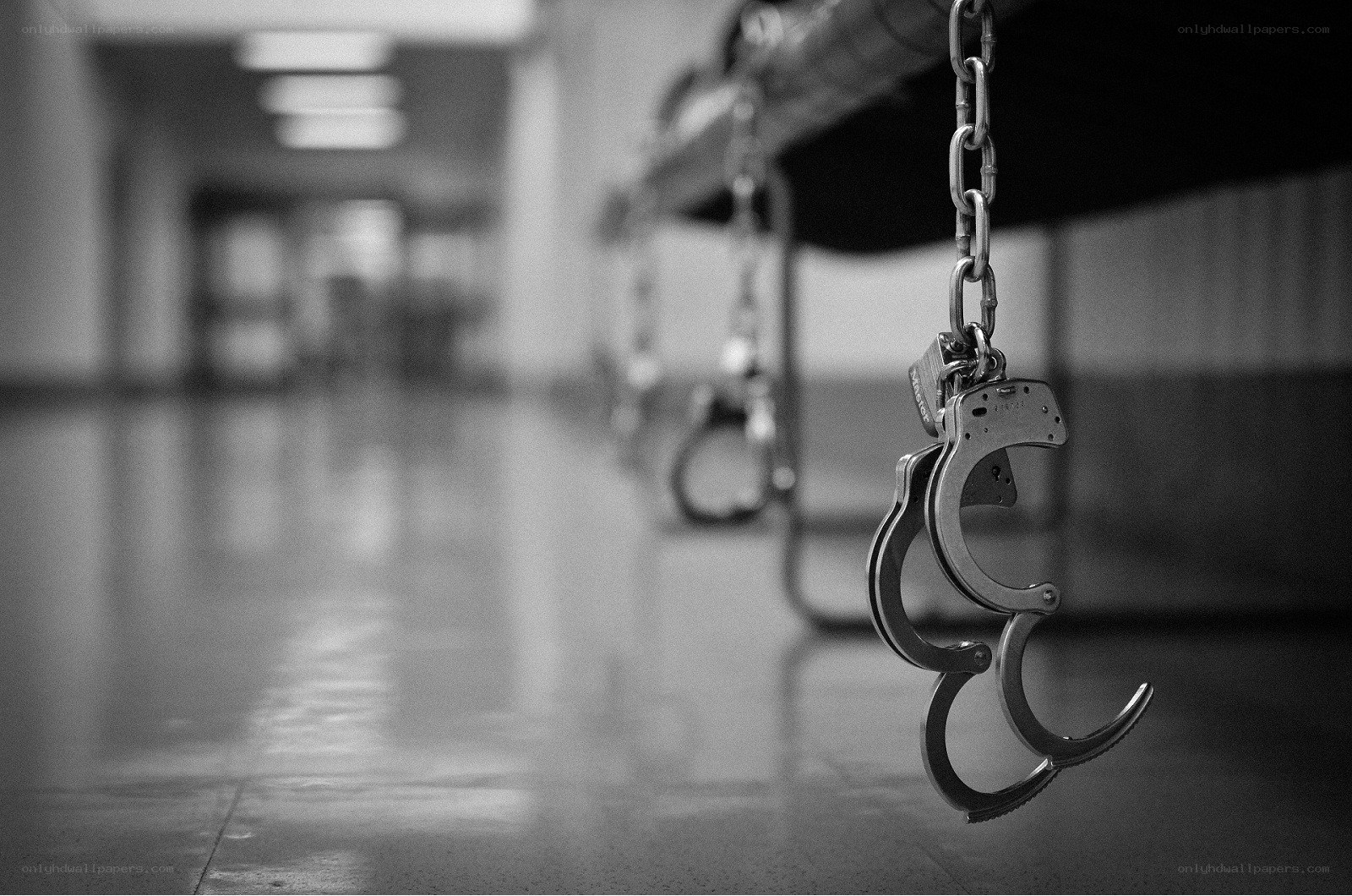Handcuffs hanging in a hallway