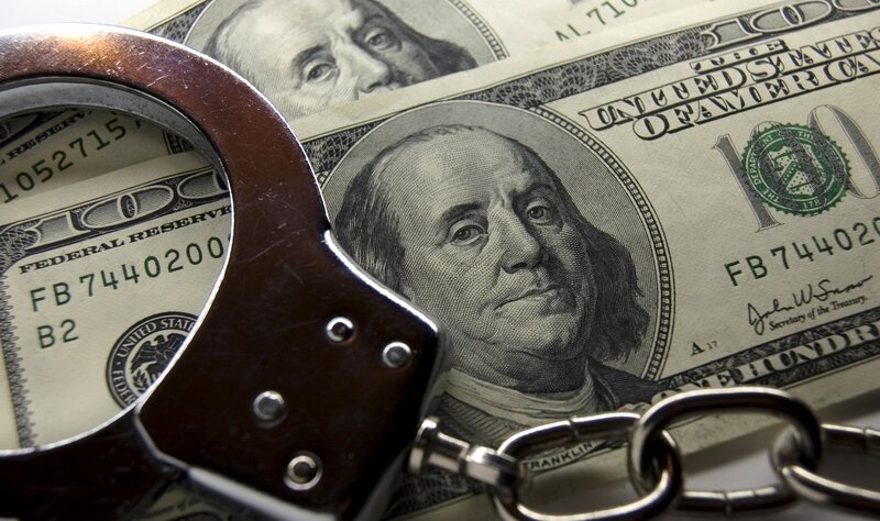 Handcuffs on Hundred-dollar Bills