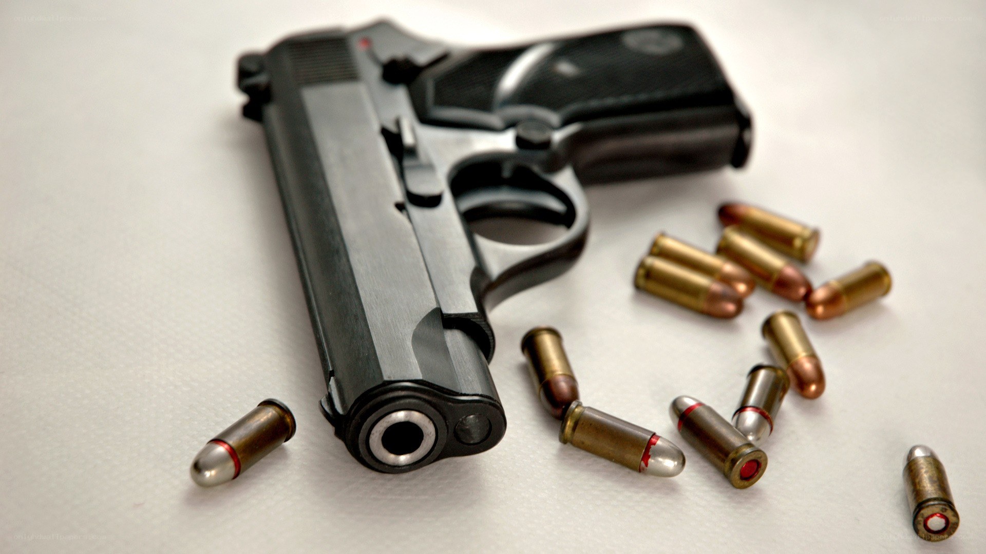 handgun with ammunition