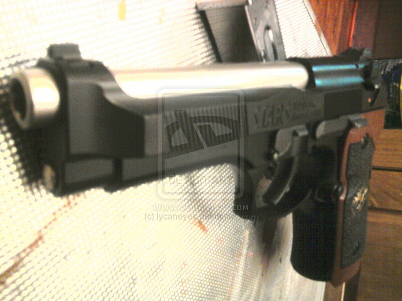 handgun with suppressor