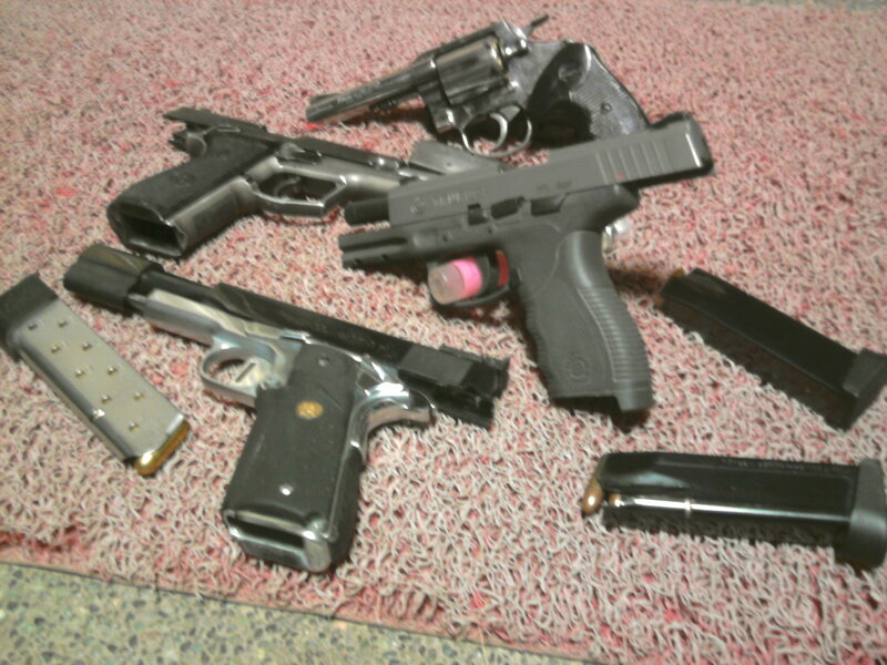 Handguns on Carpet