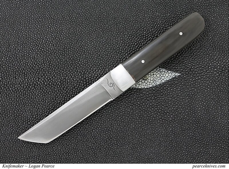 Handmade Knife on Textured Surface