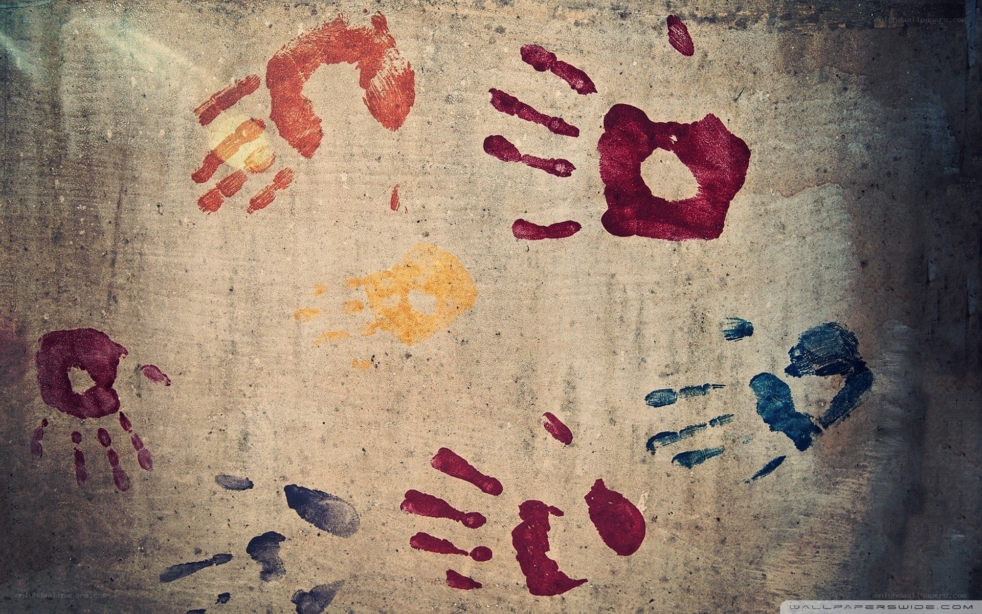 handprint art on concrete