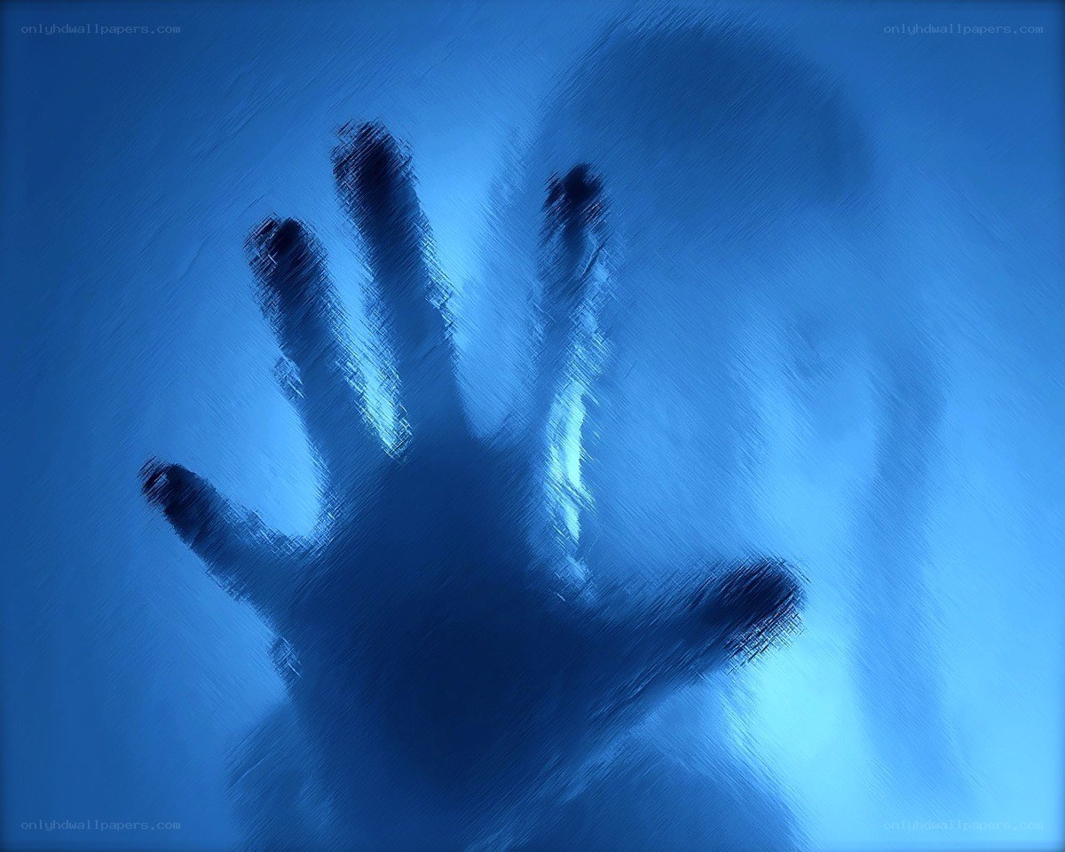 handprint on blue glass