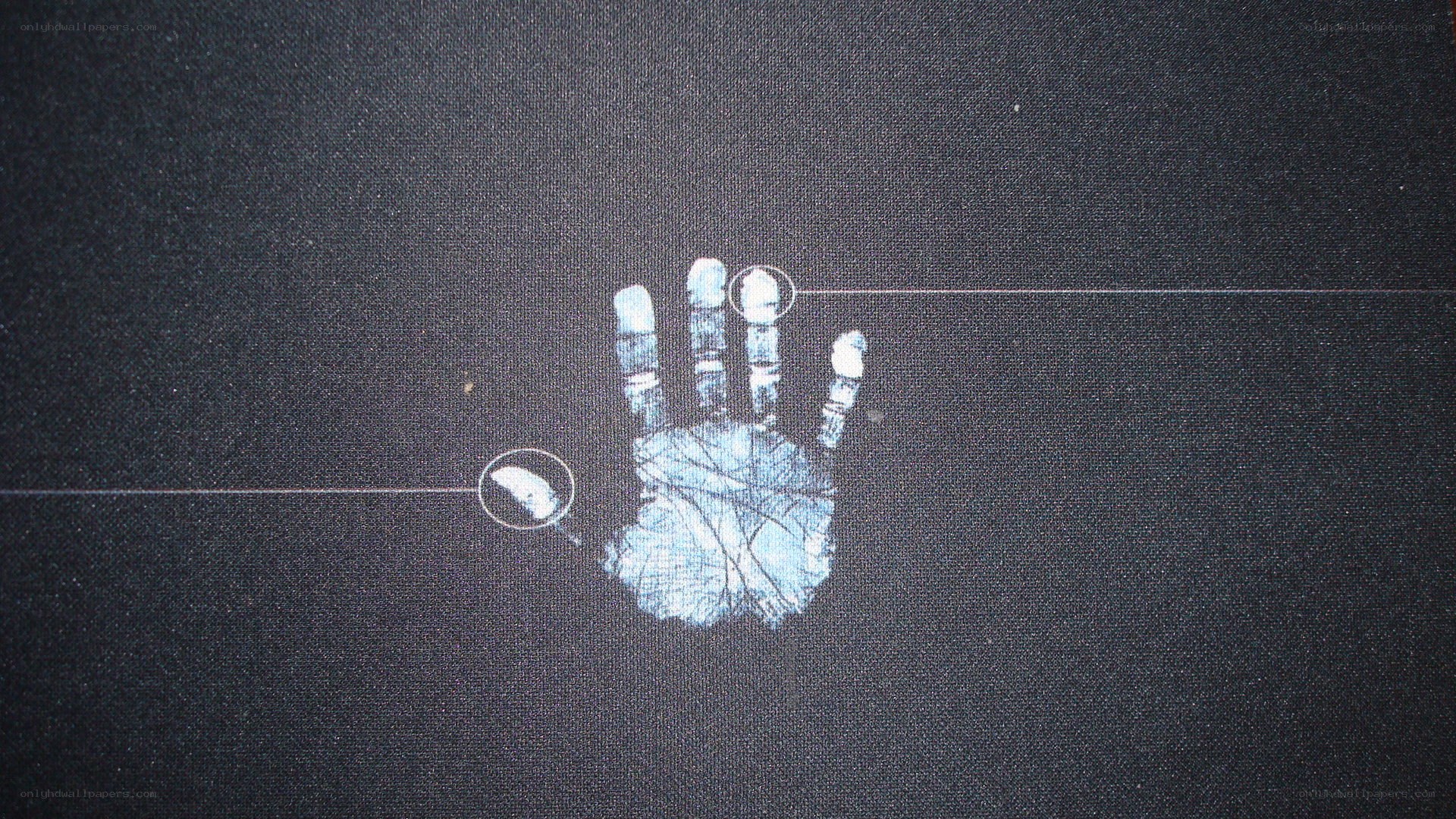 handprint on dark fabric