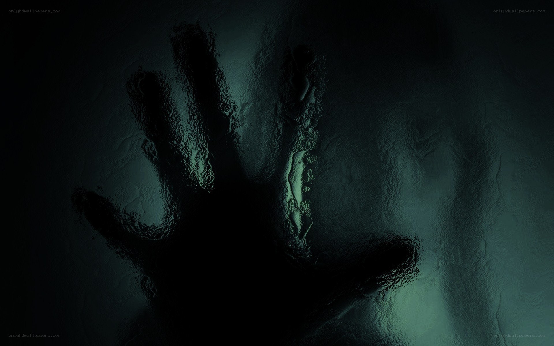 handprint on dark surface