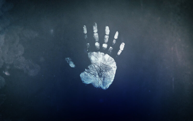 Handprint on Dark Surface — Blue, Dramatic
