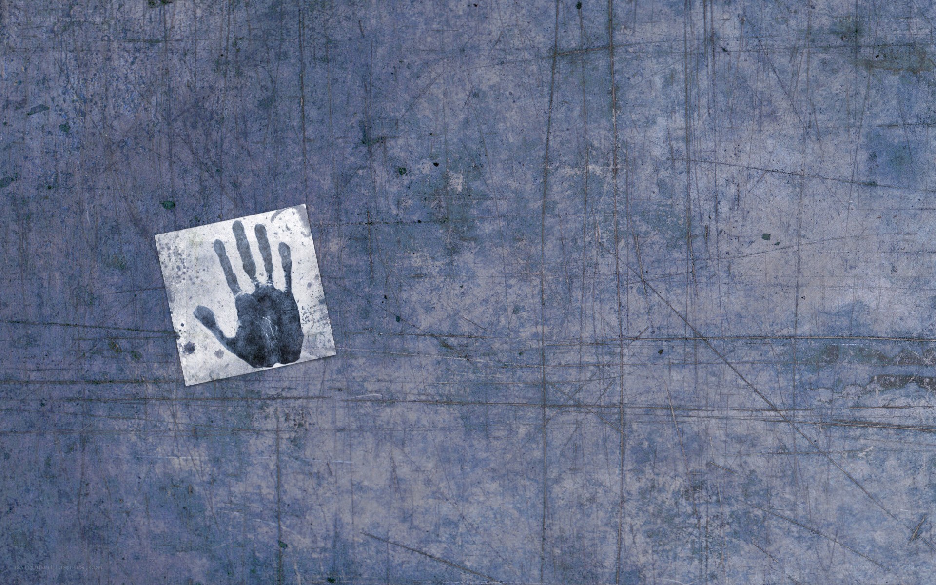 handprint on metal surface