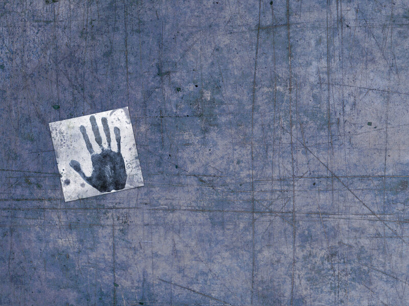 handprint on metal surface